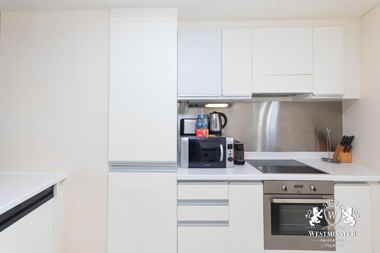 Westminster Dubai Mall Bagian luar foto A typical kitchen in a Westminster apartment