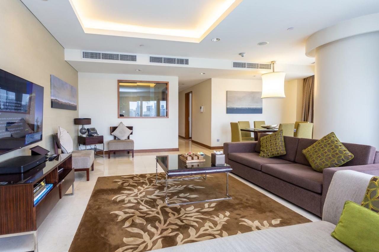 Westminster Dubai Mall Bagian luar foto A living room in a typical apartment